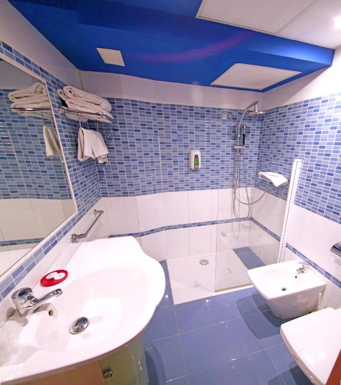 Koupelna v ubytování Hotel Paris Centro
