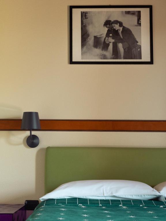 Postel nebo postele na pokoji v ubytování Janas Country Resort