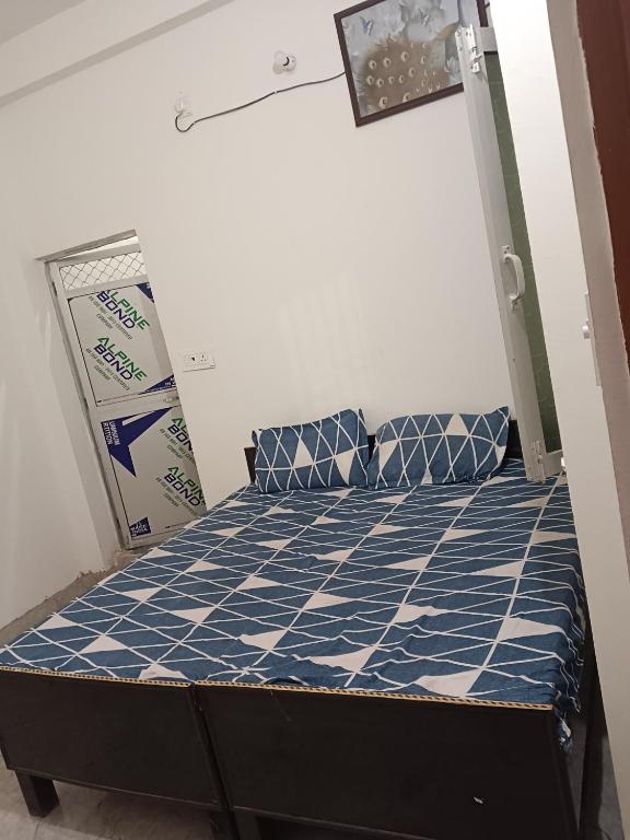 Postel nebo postele na pokoji v ubytování Ramrameti Homestay