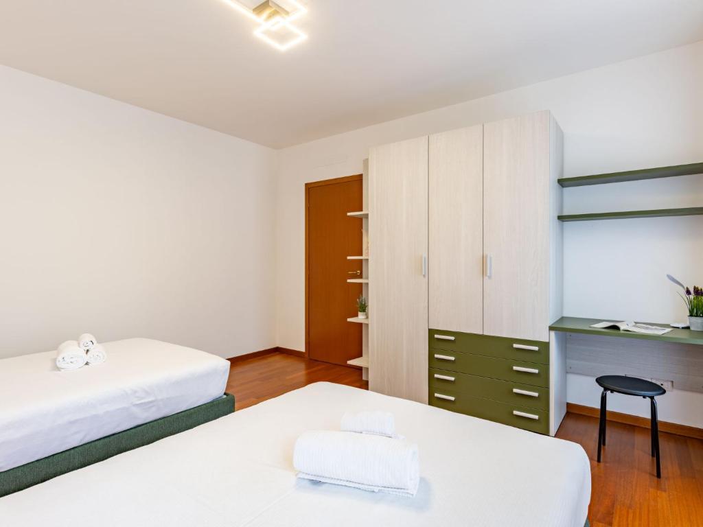 Postel nebo postele na pokoji v ubytování Apartment Platani by Interhome