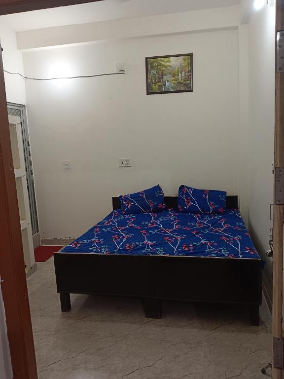 Postel nebo postele na pokoji v ubytování Ramrameti Homestay