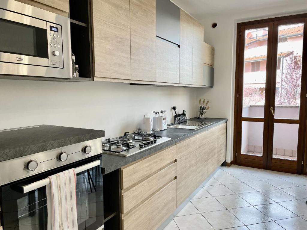 Kuchyň nebo kuchyňský kout v ubytování Apartment Platani by Interhome