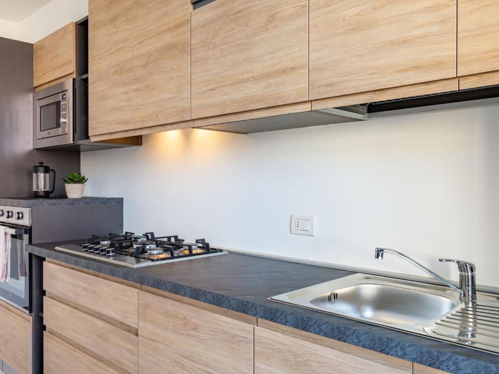 Kuchyň nebo kuchyňský kout v ubytování Apartment Platani by Interhome