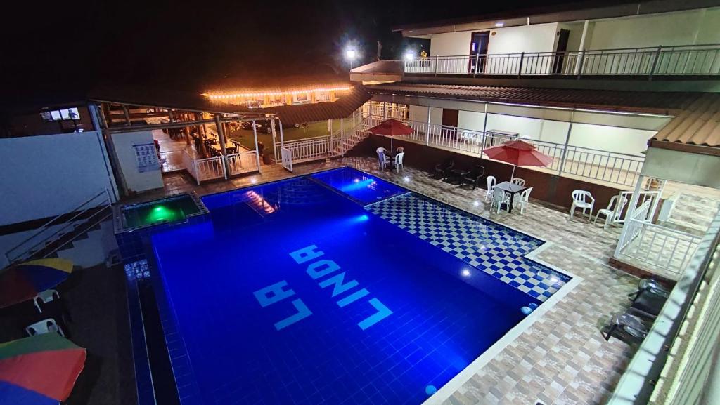 Utsikt över poolen vid Finca Hotel La Linda eller i närheten