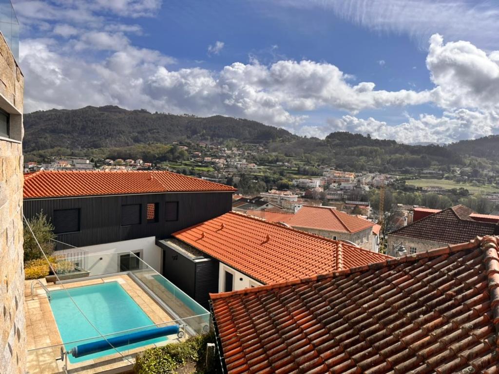 a view from the roof of a house with a swimming pool at Casa Sao Bento in Arcos de Valdevez