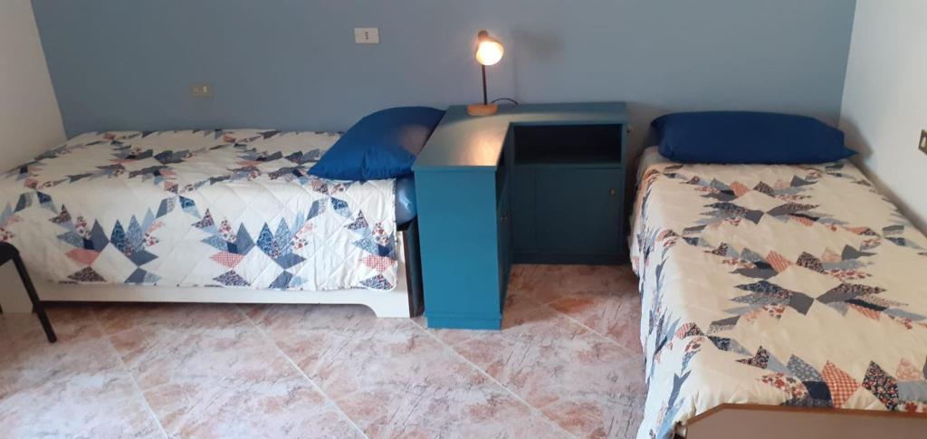 Postel nebo postele na pokoji v ubytování Silla House - A due passi dal lago