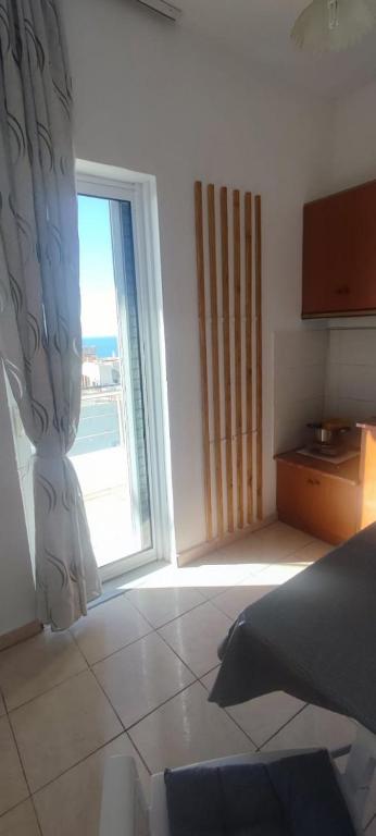 Postel nebo postele na pokoji v ubytování Ionian View
