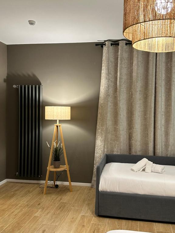Postel nebo postele na pokoji v ubytování Dimora Del Ragno
