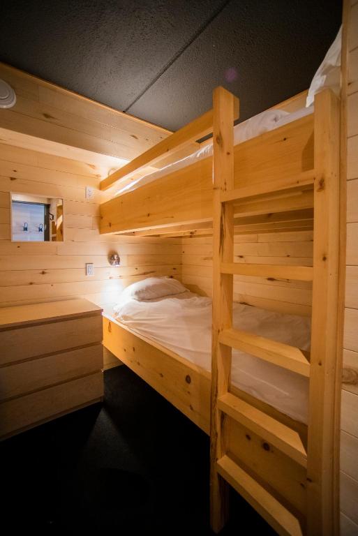 Palanda nebo palandy na pokoji v ubytování Hotel de l'Horizon