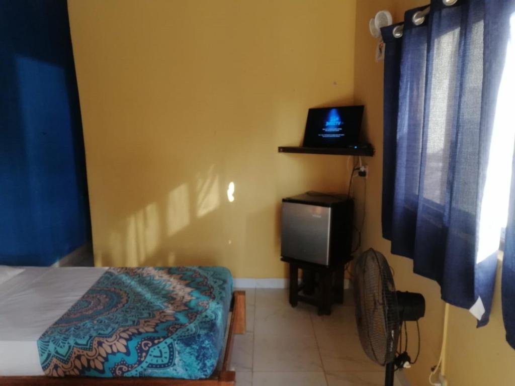Postel nebo postele na pokoji v ubytování Punta Pacífico Bungalows Máncora