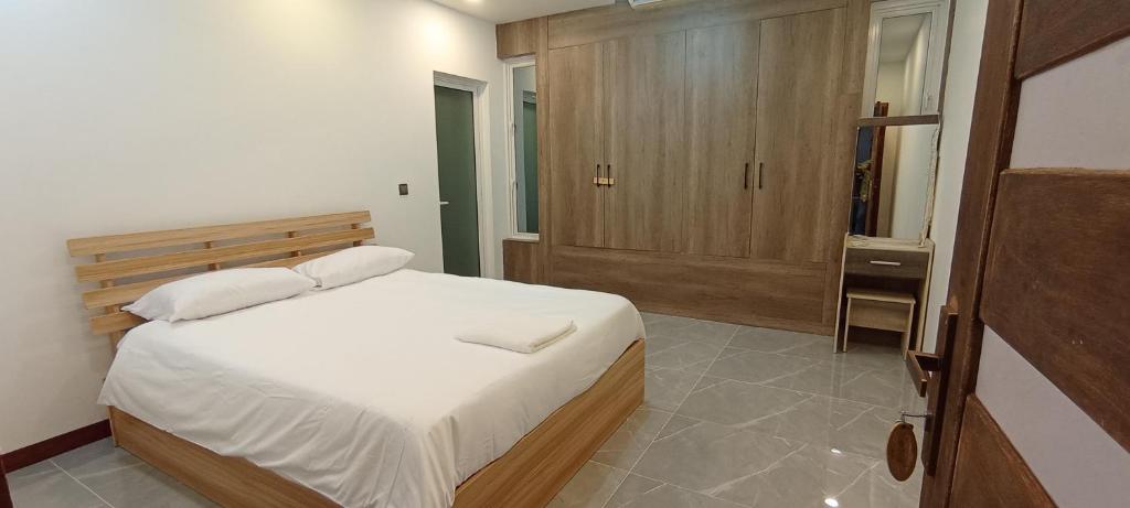 Postel nebo postele na pokoji v ubytování Shitha Inn