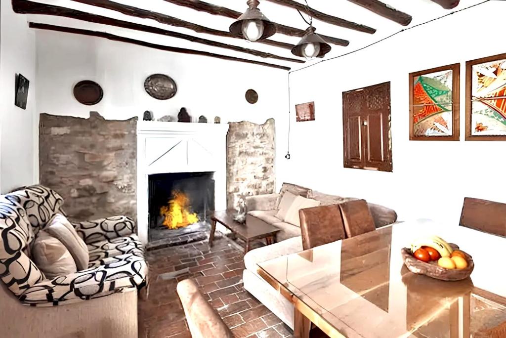 Posedenie v ubytovaní Elegant Villa in Granada with Pool and Garden