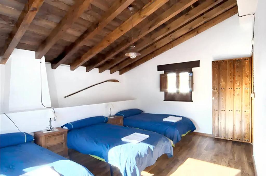 Posteľ alebo postele v izbe v ubytovaní Elegant Villa in Granada with Pool and Garden