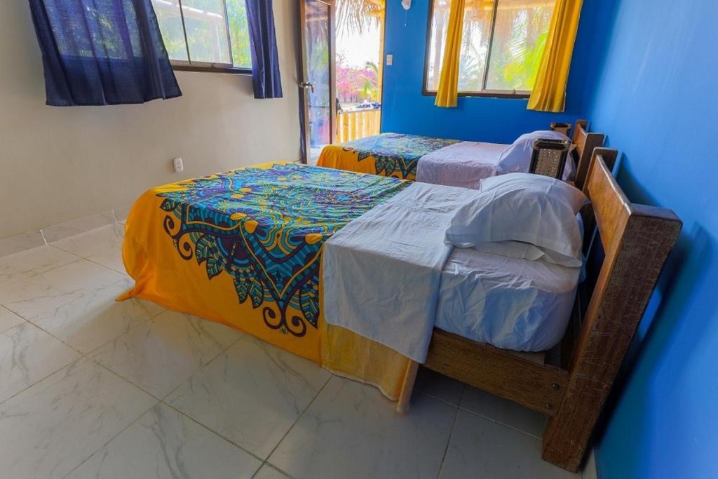 Postel nebo postele na pokoji v ubytování Punta Pacífico Bungalows Máncora