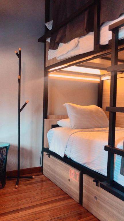 Postel nebo postele na pokoji v ubytování Bendito Hostels