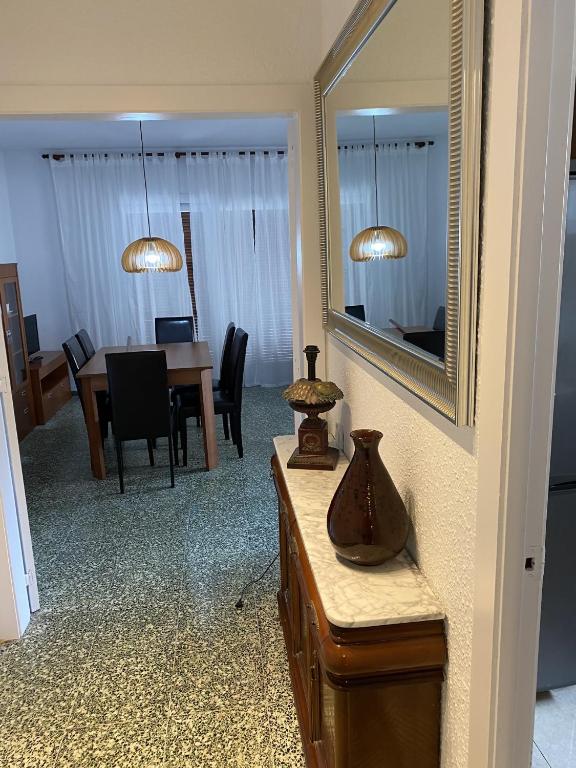 Televízia a/alebo spoločenská miestnosť v ubytovaní Apartamento con Feng Shui