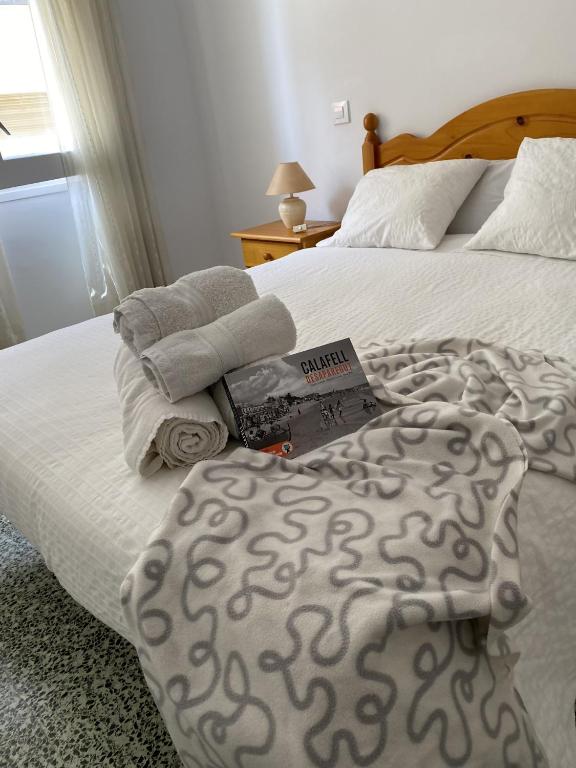 Posteľ alebo postele v izbe v ubytovaní Apartamento con Feng Shui