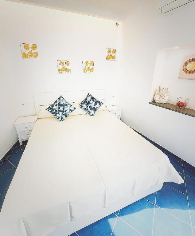 Кровать или кровати в номере B&B La Danza del Mare