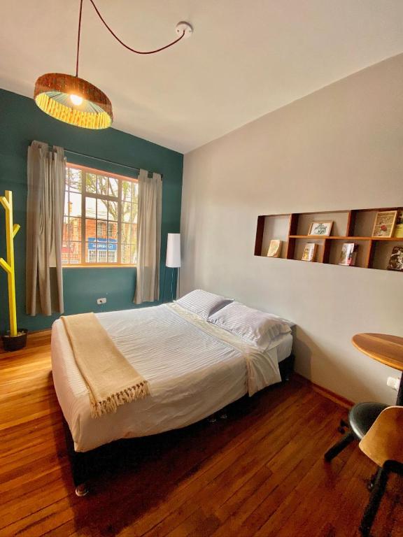 Postel nebo postele na pokoji v ubytování Bendito Hostels