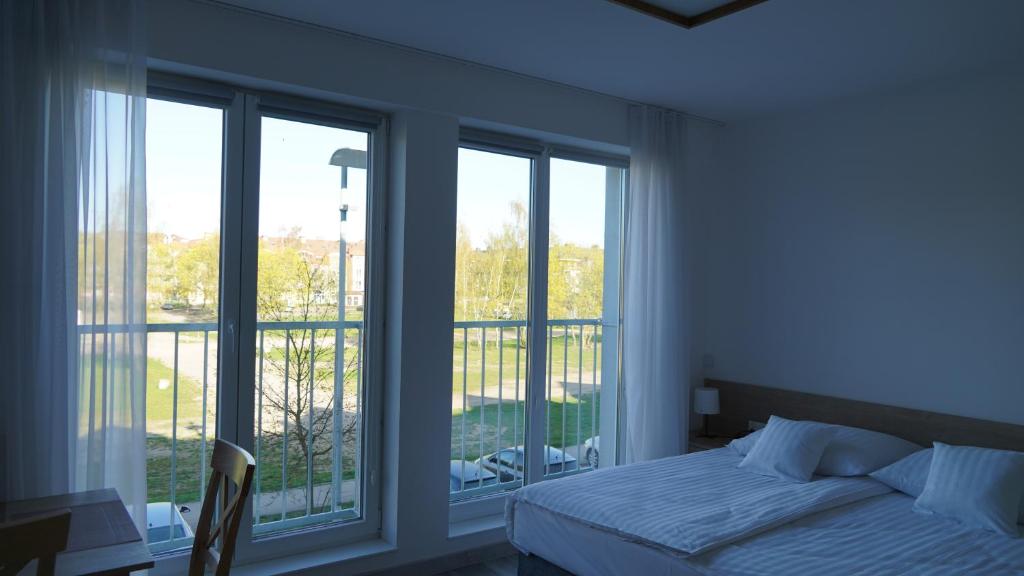 Postel nebo postele na pokoji v ubytování Apartament Aparthotel Passage