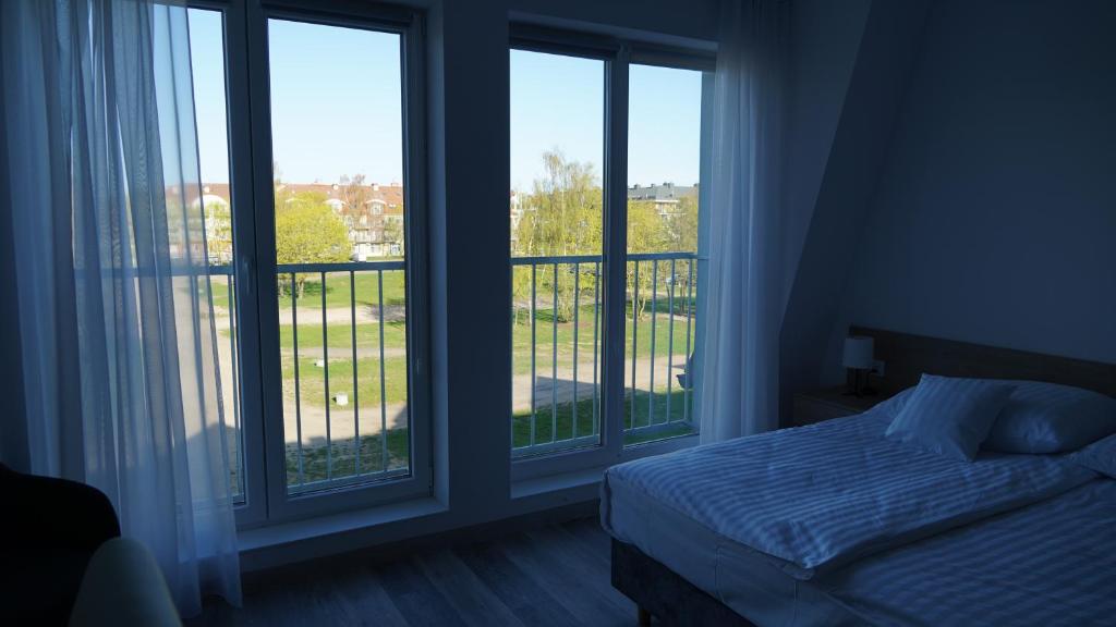 Postel nebo postele na pokoji v ubytování Apartament Aparthotel Passage