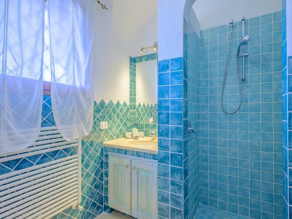 Kúpeľňa v ubytovaní Sardinia Family Villas - Villa Brunilde with private pool