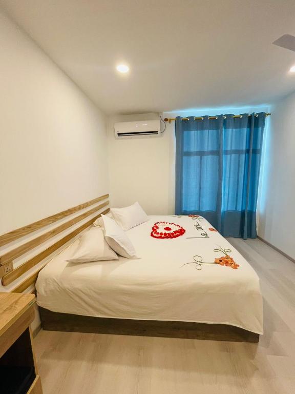 Postel nebo postele na pokoji v ubytování Shitha Inn