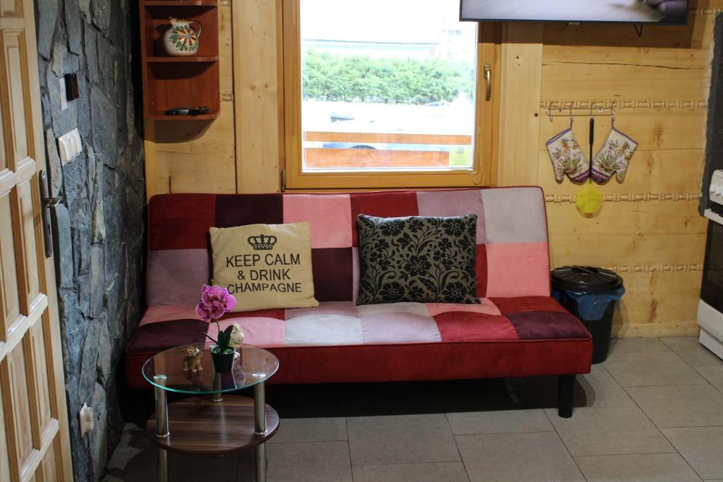A seating area at Štýlový Zrub Martina A s kúpacou Kaďou a detským ihriskom!