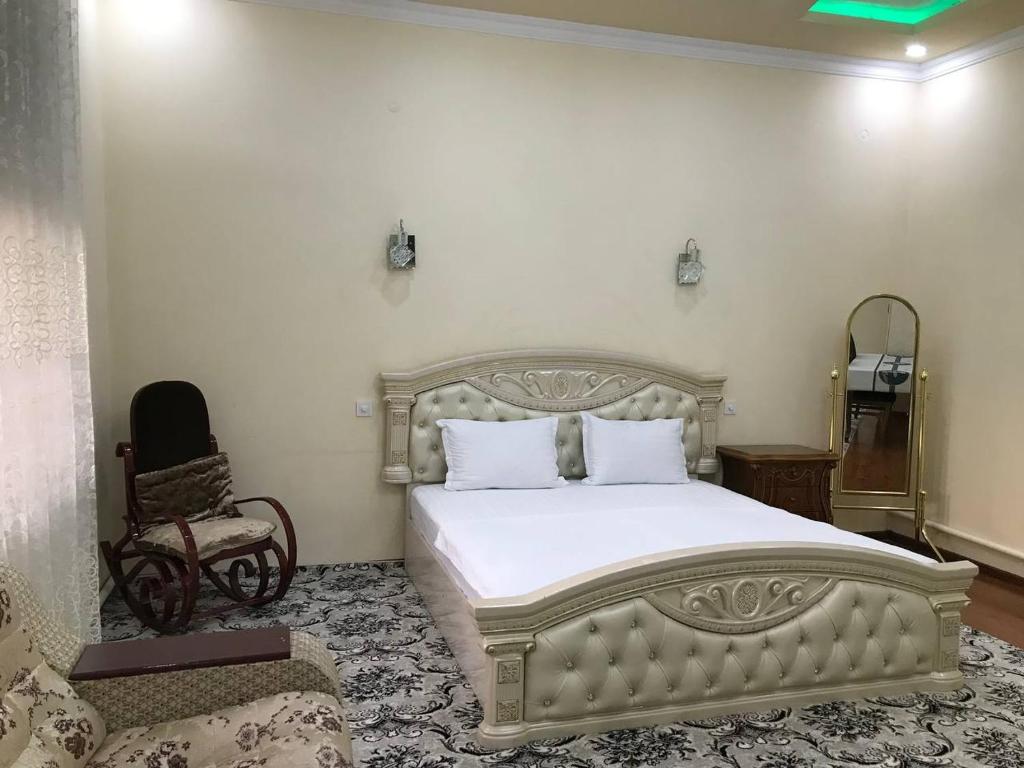 Ein Bett oder Betten in einem Zimmer der Unterkunft Шербудин