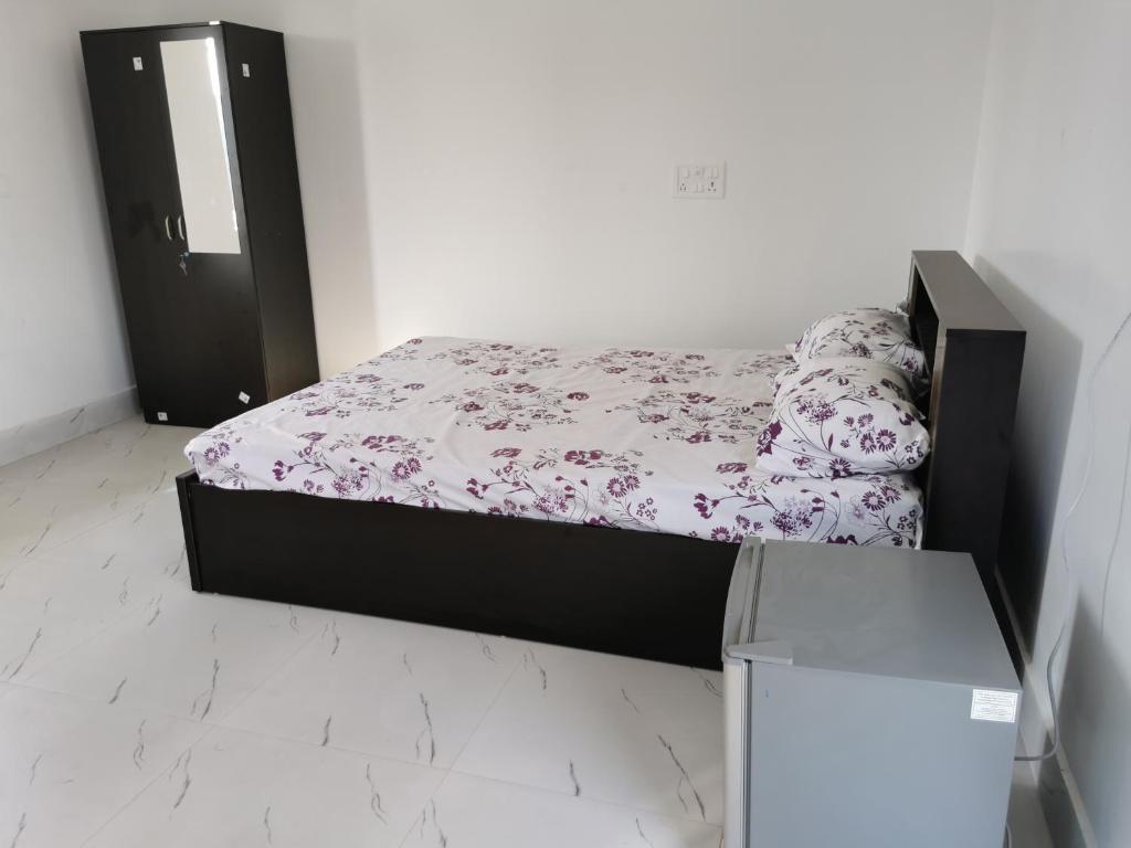 Postel nebo postele na pokoji v ubytování Chairosana Mansion