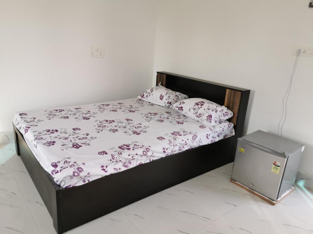 Postel nebo postele na pokoji v ubytování Chairosana Mansion