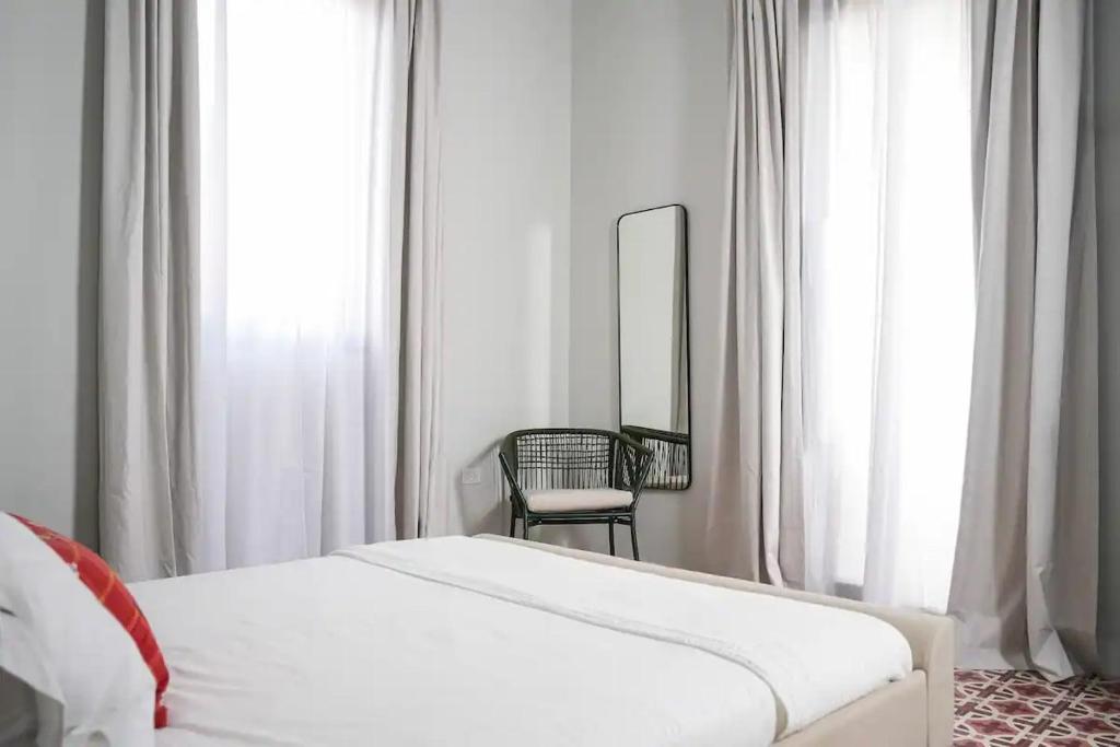 Postel nebo postele na pokoji v ubytování Patio Elba Boutique Hotel