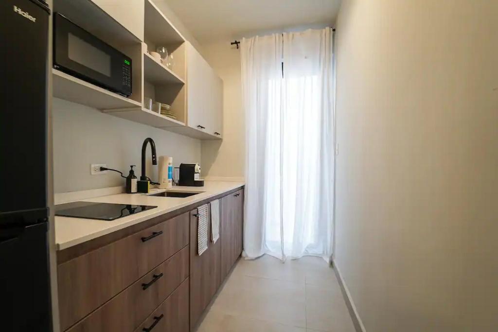 Kuchyň nebo kuchyňský kout v ubytování Patio Elba Boutique Hotel