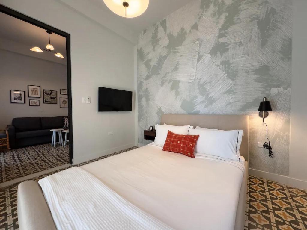 Postel nebo postele na pokoji v ubytování Patio Elba Boutique Hotel