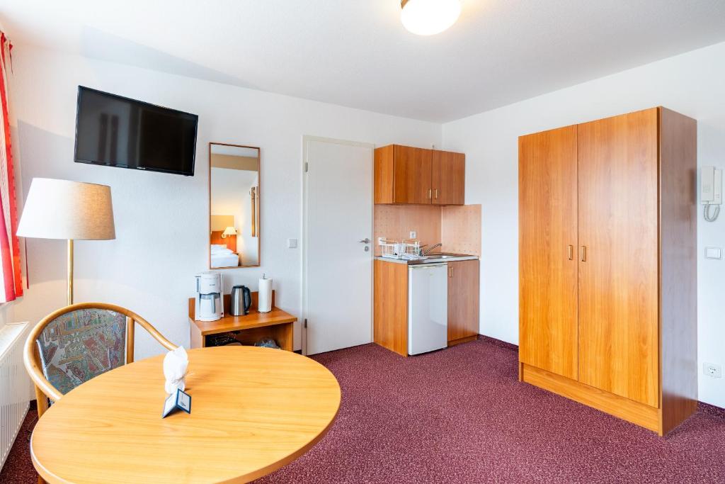 Kuchyň nebo kuchyňský kout v ubytování Pension Wald und See