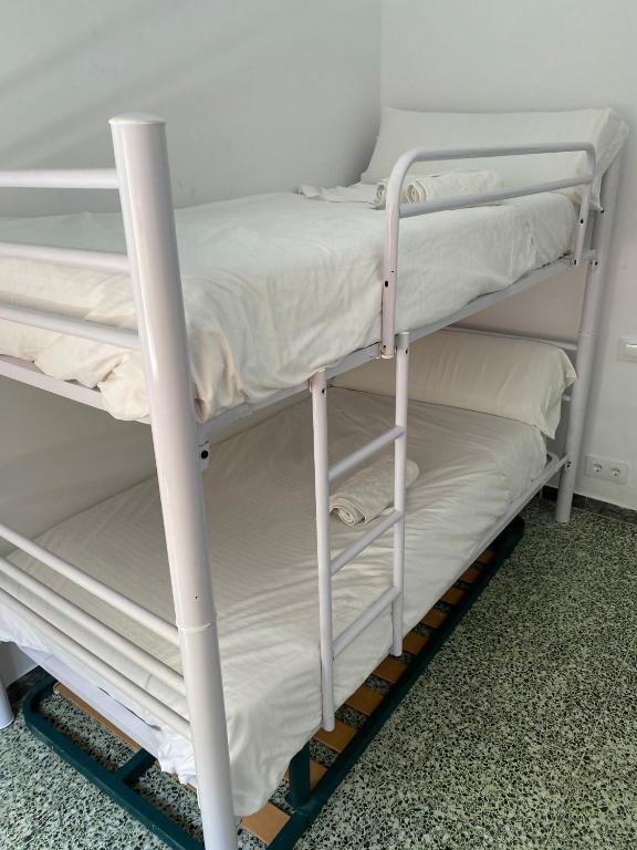 Posteľ alebo postele v izbe v ubytovaní Apartamento con Feng Shui
