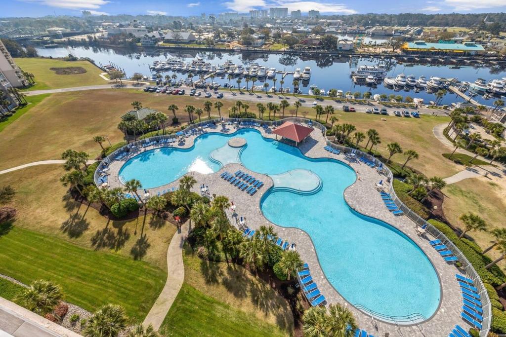 Πισίνα στο ή κοντά στο Harbor Pointe Coastal Getaway