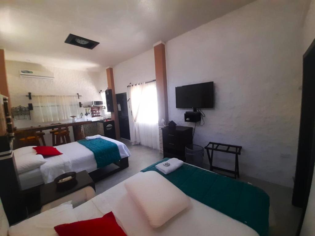 Postel nebo postele na pokoji v ubytování Hostal Cann's House