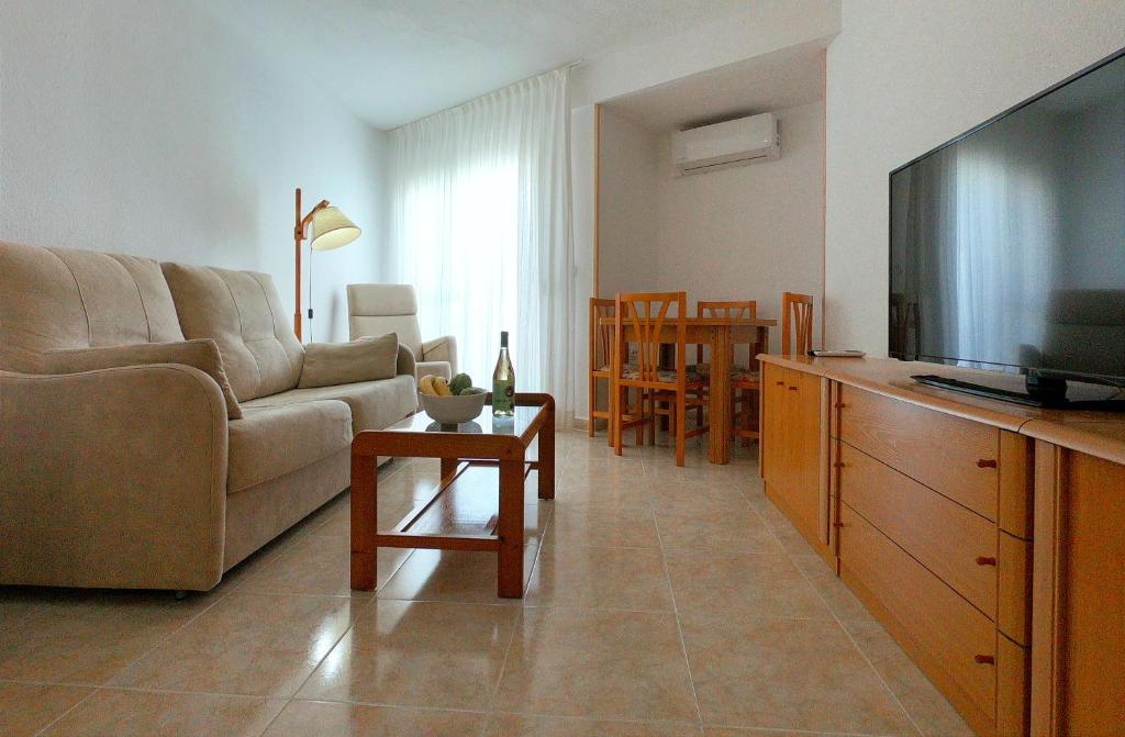 TV a/nebo společenská místnost v ubytování La Linea