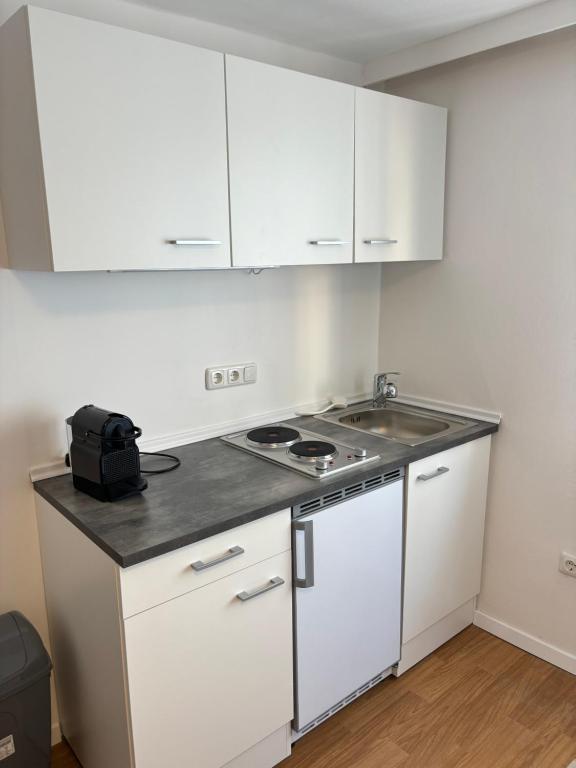 Kuchyň nebo kuchyňský kout v ubytování Zentrale Wohnung Gmunden Alte Bäckerei