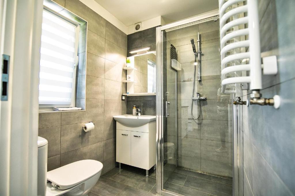 Kúpeľňa v ubytovaní Apartamenty Izabell by Housine