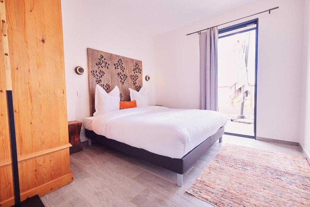 Postel nebo postele na pokoji v ubytování Villa avec jardin et piscine