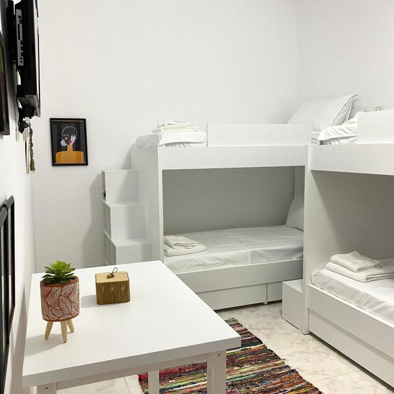 Letto o letti in una camera di Ziu Guest House