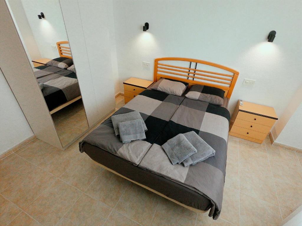 Postel nebo postele na pokoji v ubytování La Linea