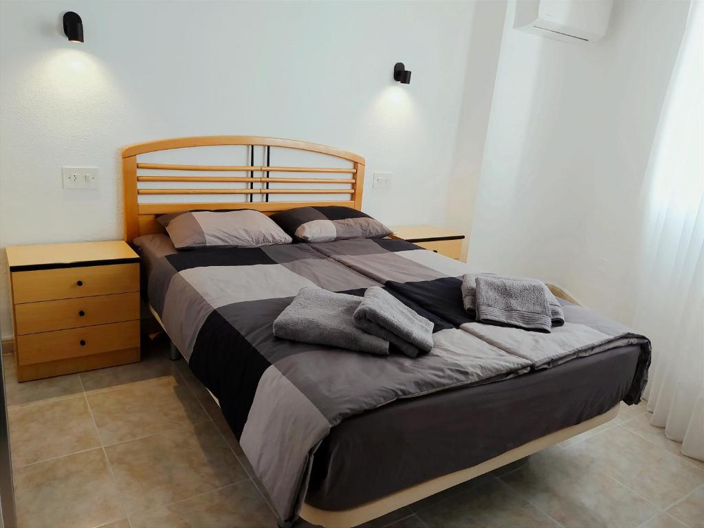 Postel nebo postele na pokoji v ubytování La Linea