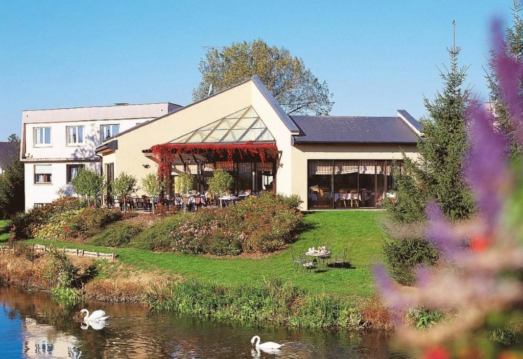 Zahrada ubytování L'Hôtel des Bords de L'ill
