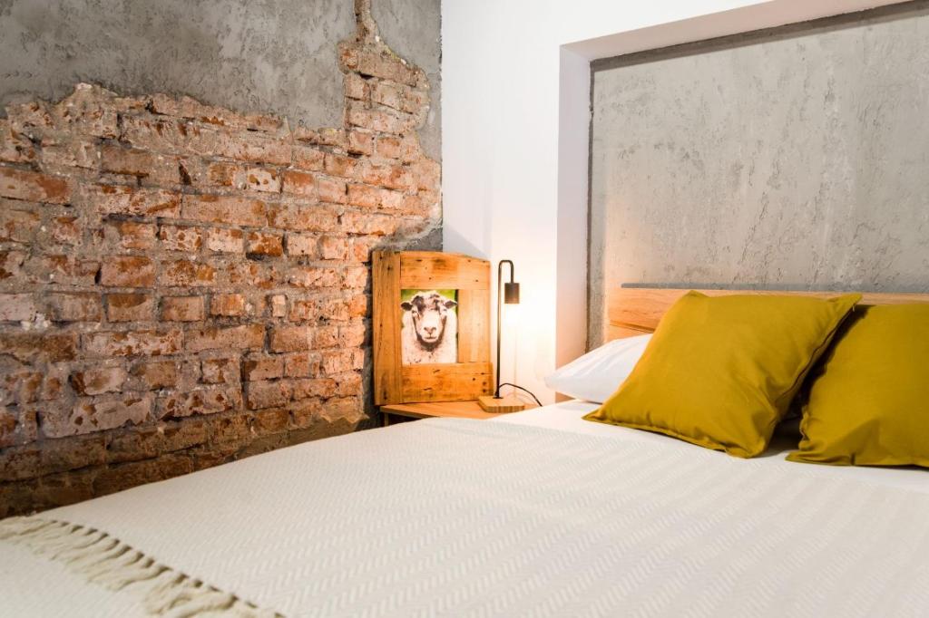 Postel nebo postele na pokoji v ubytování Narnia LOFT