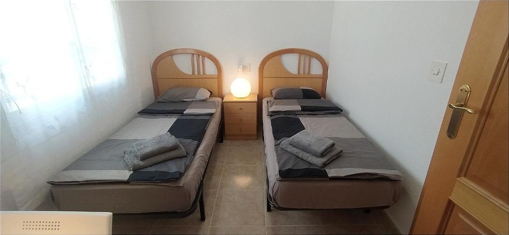Postel nebo postele na pokoji v ubytování La Linea
