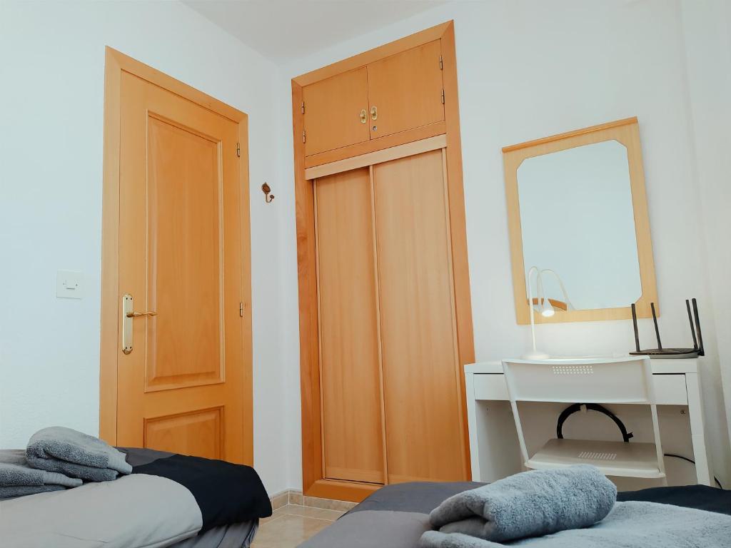 Postel nebo postele na pokoji v ubytování La Linea