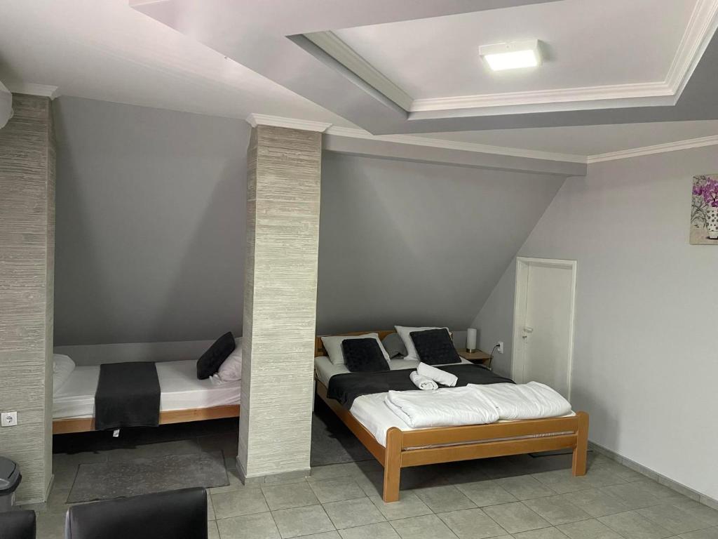 Krevet ili kreveti u jedinici u okviru objekta Feher Akac Guest House